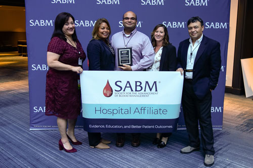 Representatives from SABM awarding a hospital affiliate certification to representatives from RWJ Barnabas Health