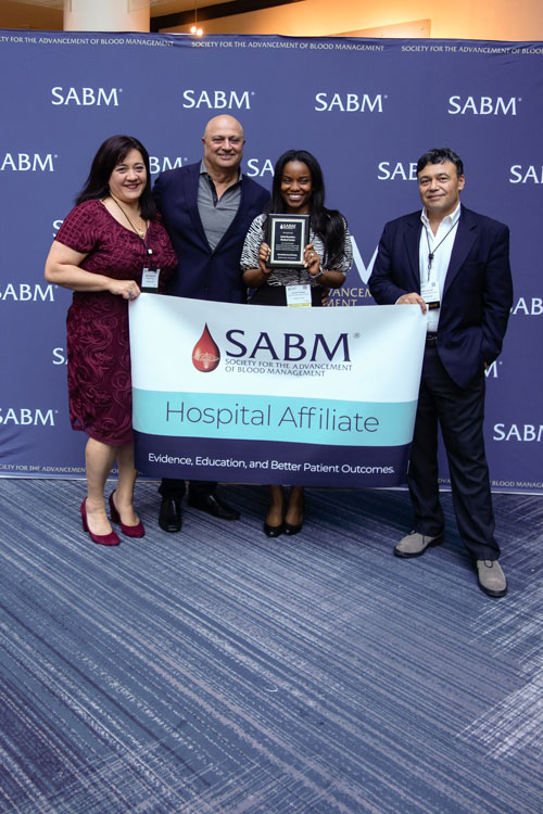 Representatives from SABM awarding a hospital affiliate certification to representatives from Saint Barnabas Medical Center