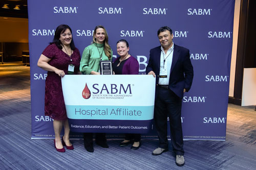 Representatives from SABM awarding a hospital affiliate certification to representatives from Tower Health